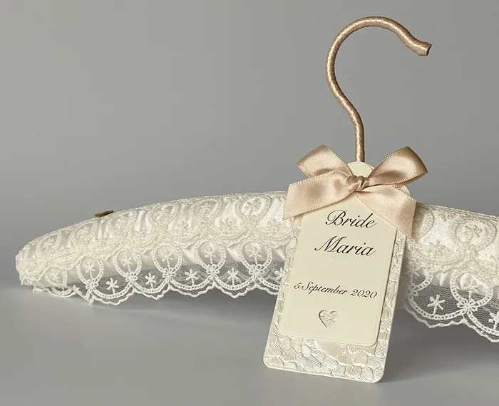 A custom bridal hanger for her wedding dress